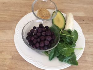 frozen blueberries, banana, greens, ground flaxseed, avocado