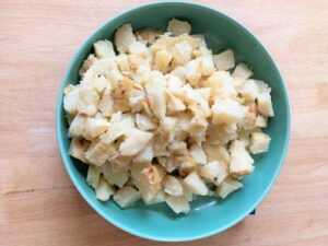 potato salad | diced potatoes in blue bowl