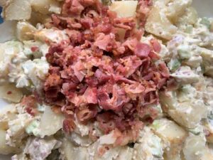 chopped bacon on potato salad